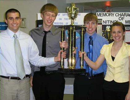 students with trophy